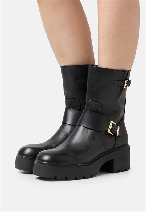 black michael kors ankle boots|michael kors cowboy boots.